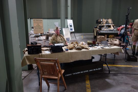 Pvt. Cooper-ski mans the display table.