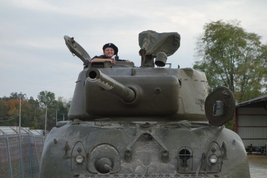 Sunday afternoon was very busy with egress of vehicles from the farm back to W.O.L. storage. There was time for Alisa to have a little fun riding around in the Sherman before it goes back into the stable.
