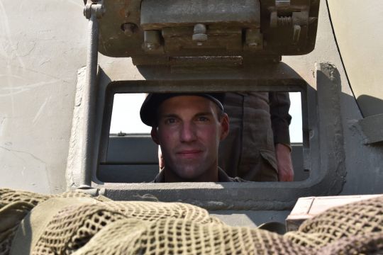 Zach prepares to drive over the cameraman.