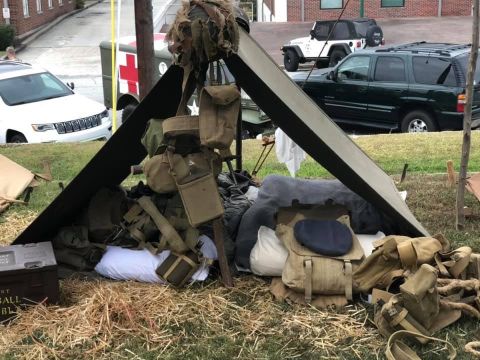 Attempting to give an idea of life in the field. Tree limbs for tent poles and a spare canvas tarp made a ready shelter, until it rained Saturday night.