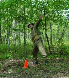Dennis begins his No.36 Mills bomb toss.